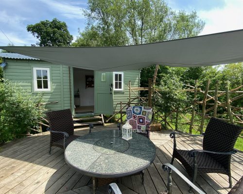 shepherd hut - Worcestershire off grid Glamping - outdoor seating fire pit BBQ